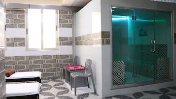 Steam room, mud baths, deep-tissue massages, 3 treatment rooms, massages