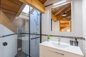 Shower, hair dryer, towels, soap