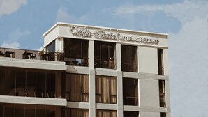 A building with a sign reading 'Villa Isabel HOTEL & RESORT.' - Villa Isabel Hotel (Sorsogon City)