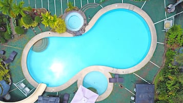 Outdoor pool, pool umbrellas, sun loungers