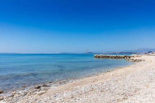 Holiday house with large terrace near sea