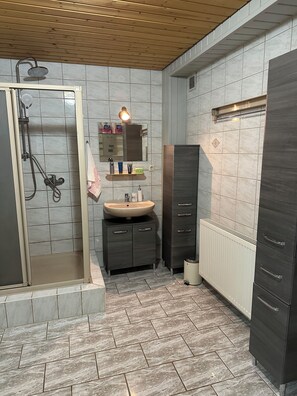 Shower, towels, soap, shampoo