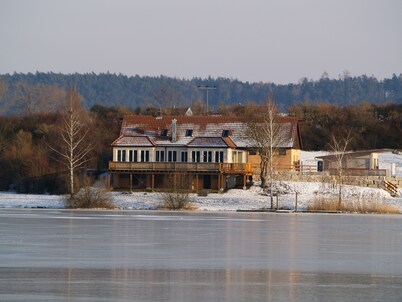 Quietly situated vacation home with a fantastic view. Bathing lake 5 min away.