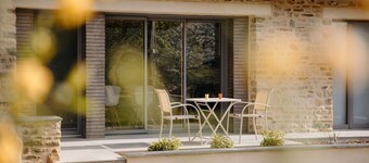 Renovated farmhouse with sauna, chalet atmosphere, in a quiet wooded setting.