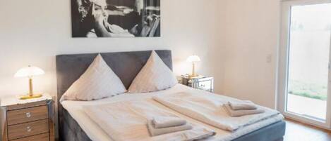 2 bedrooms, travel crib, WiFi, bed sheets