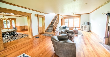 TV, fireplace, books. Charming Nature Valley Farmhouse on 53 private acres with lake view