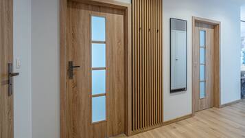 Comfort Apartment | Living area | Flat-screen TV