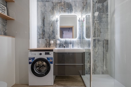 Baño. Open Air Residence 1 by Grand Apartmetns