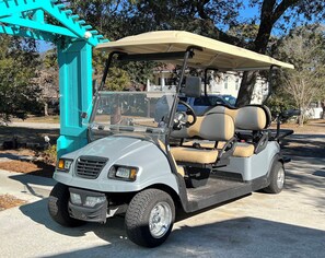 Park your golf cart on the concrete surface and enjoy a leisurely ride.