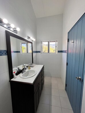 Shower, hair dryer, towels, soap