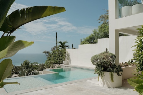 Pool. Dreamy King Bedroom Ocean view suite at Sky House Santa Teresa