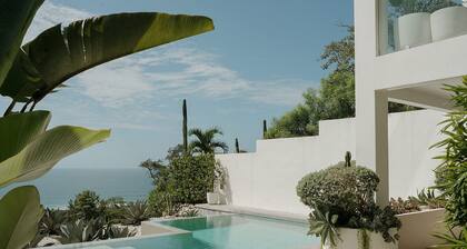 Dreamy King Bedroom Ocean view suite at Sky House Santa Teresa