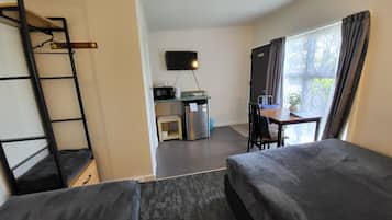 Standard Twin Room, Garden View | Blackout drapes, iron/ironing board, free WiFi