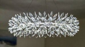 A chandelier with multiple crystal elements. - 5 Bedroom Premium Apartment Central London (London)