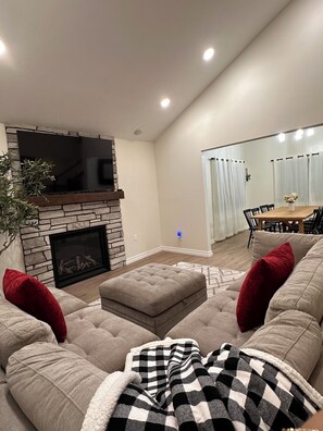 Smart TV, fireplace, table tennis, books