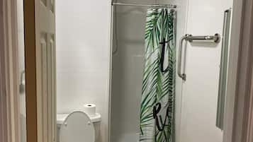 Shower, towels, soap, toilet paper