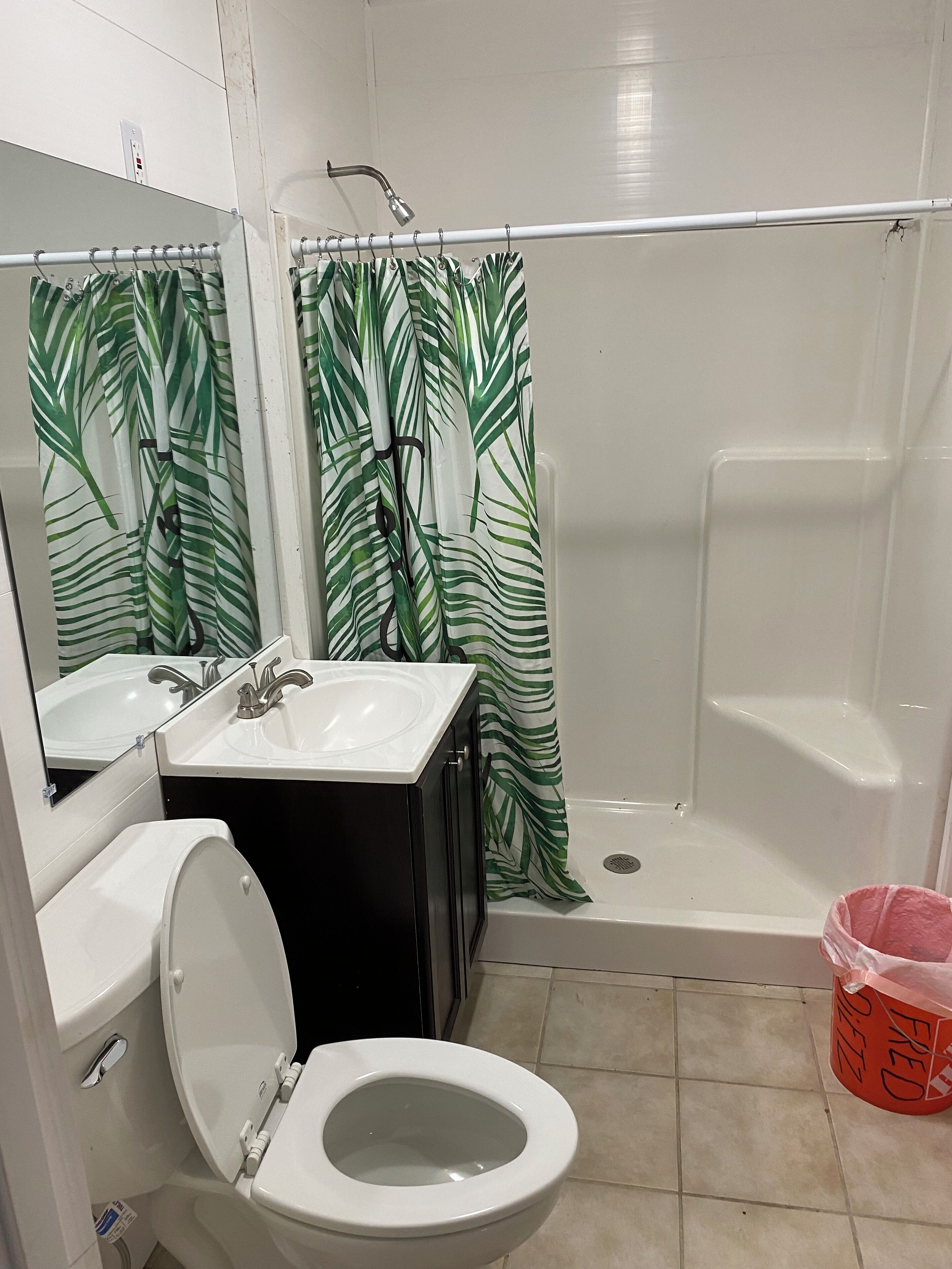 Shower, towels, soap, toilet paper