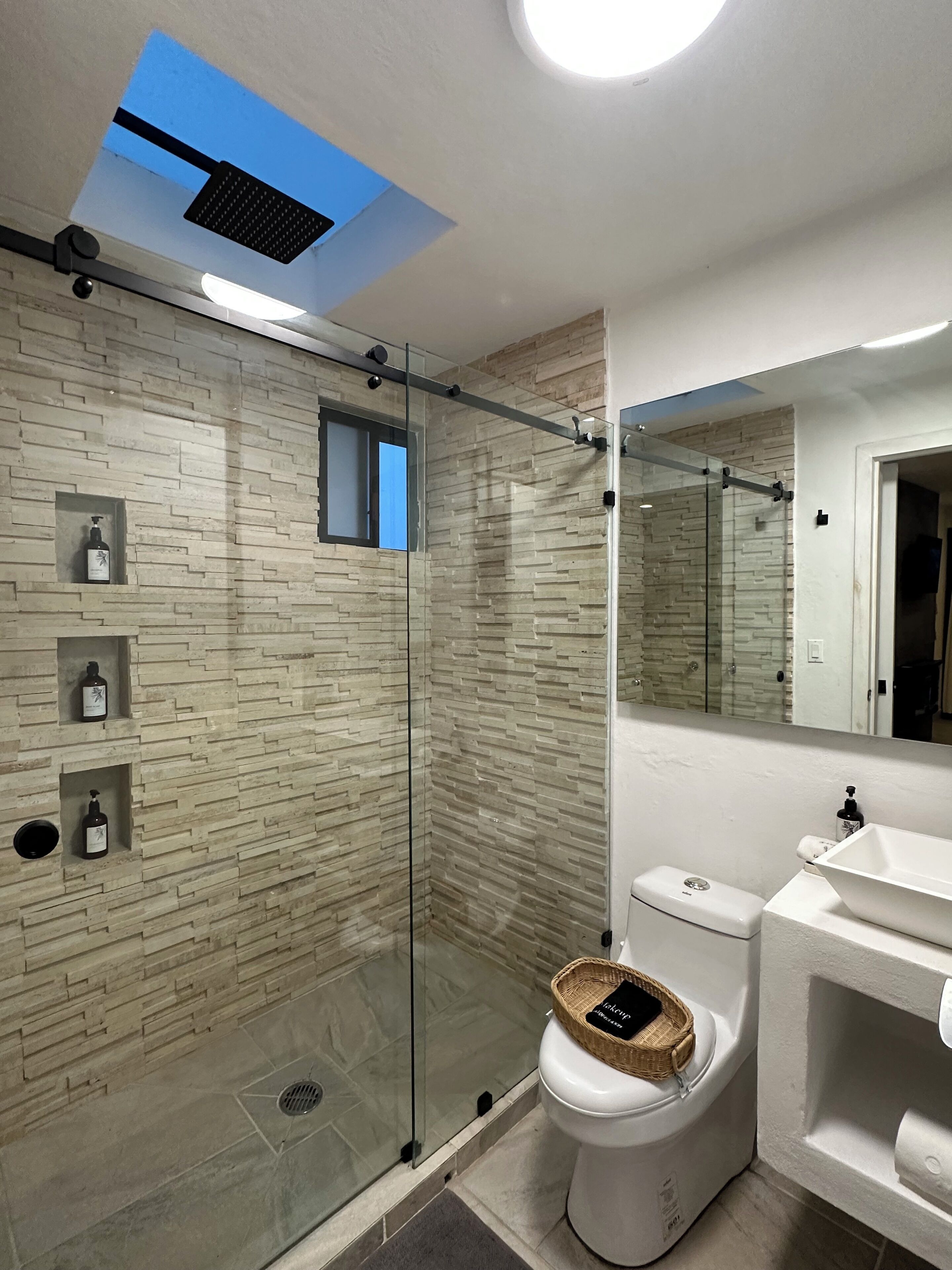 Shower, hair dryer, towels, soap