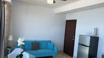Suite Deluxe, vue océan | 1 chambre, Wi-Fi gratuit, draps fournis