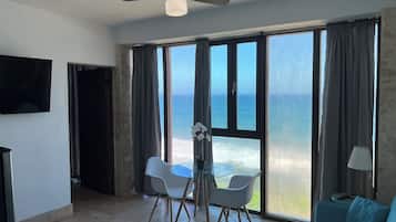 Suíte luxo, vista para o oceano | 1 quarto, Wi-Fi de cortesia, roupa de cama