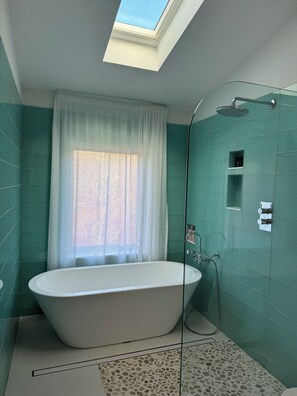 Shower, hair dryer, towels, soap