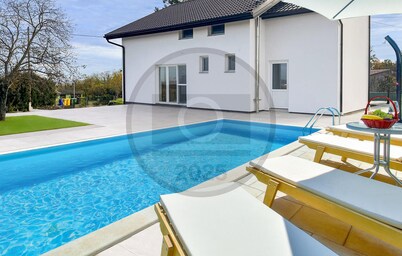 Lovely home in Batina with sauna
