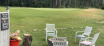 Candle Lake retreat backing the 5th green of the golf course.