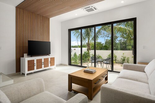 New Modern Seascape Townhome #14  in Tropical Grace Bay!