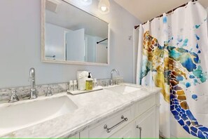 Hair dryer, towels, soap, shampoo