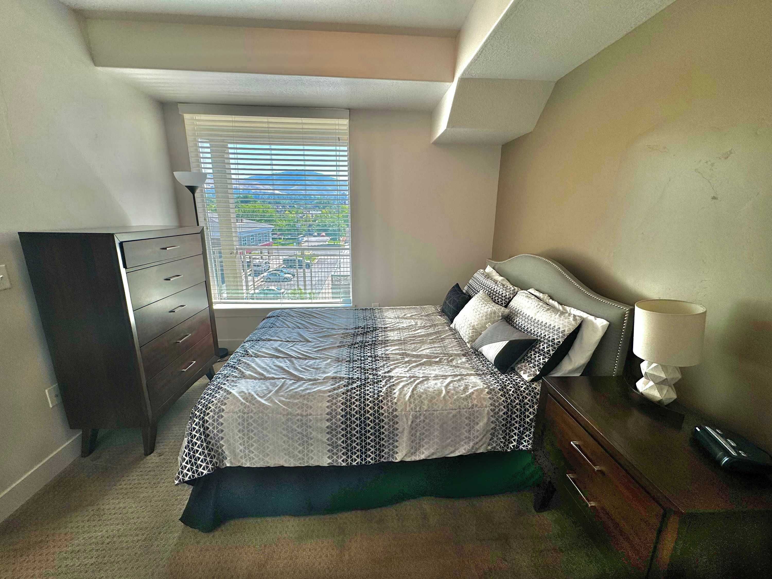 1 bedroom, desk, iron/ironing board, travel crib