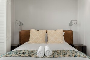 2 bedrooms, in-room safe, iron/ironing board, internet