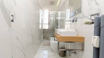 Apartment, Courtyard View | Bathroom | Shower, free toiletries, hair dryer, towels