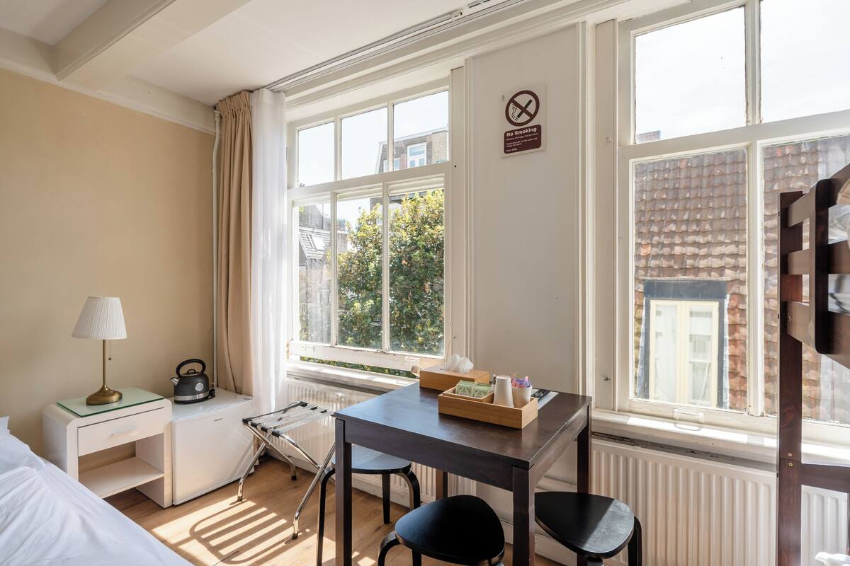 Habitación cuádruple superior | Wifi gratis, decoración individual, ropa de cama