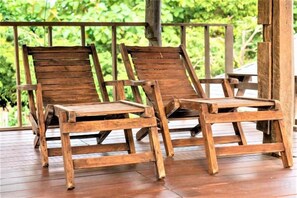 Two wooden lounge chairs on a wooden deck with a railing. - Phi Private Villa: Luxury 4 beds Riverside & Pool: Near old townBreakfast, Laundry, Free pickup (Chiang Mai)