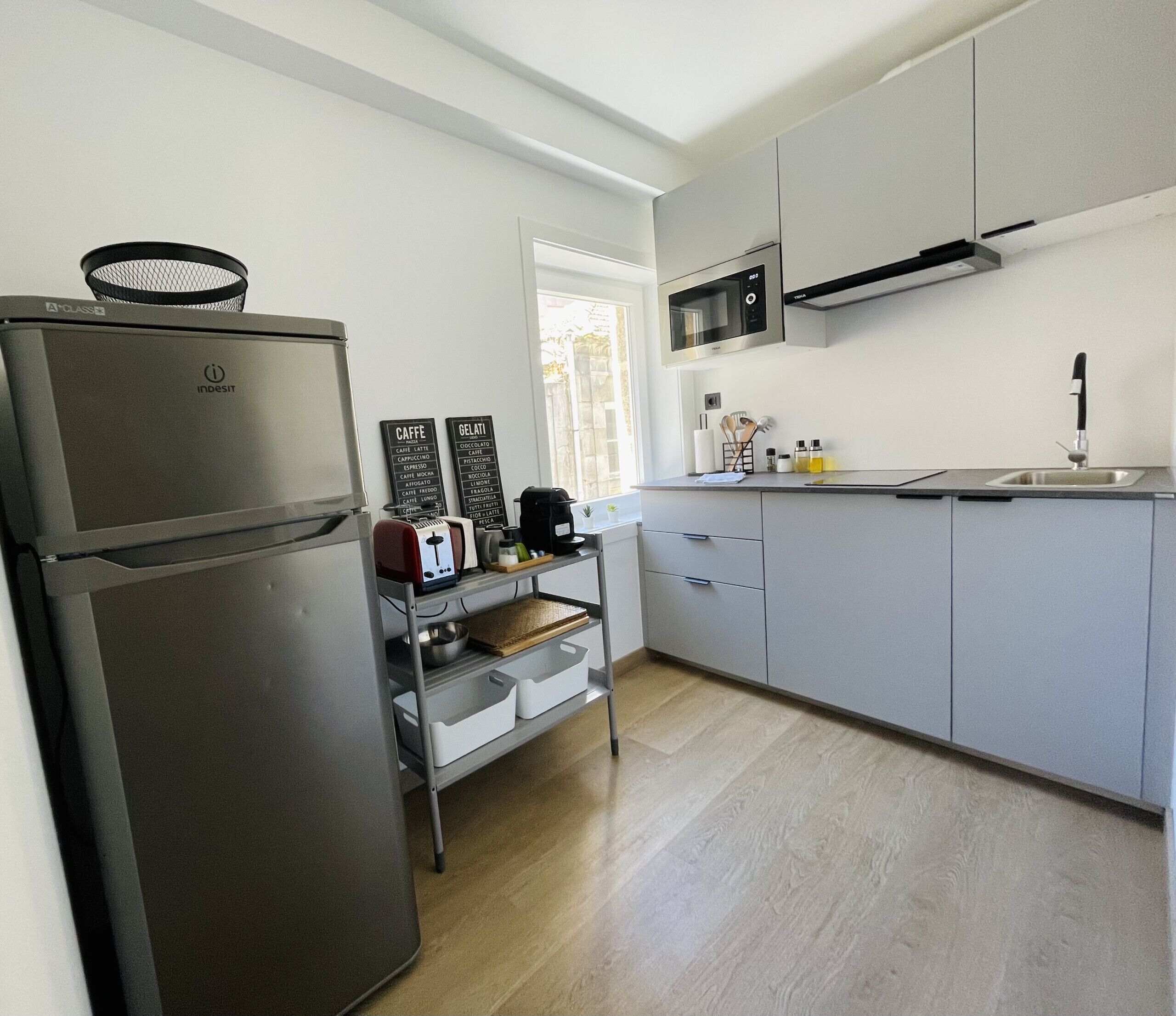 Fridge, microwave, stovetop, coffee/tea maker