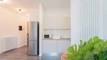 Appartamento (Central & Green Apartment) | Cucina privata | Frigorifero, forno, macchina per caffè espresso, bollitore elettrico