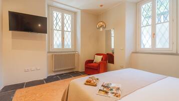 Apartamento (1 Bedroom) | 1 quarto, ferros/tábuas de passar roupa, roupa de cama