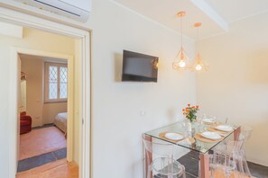 Apartment (1 Bedroom) | Living area | 32-inch Smart TV with cable channels