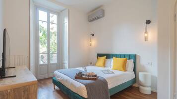 Appartement (1 Bedroom) | 1 slaapkamer, een strijkplank/strijkijzer, babybedden, beddengoed