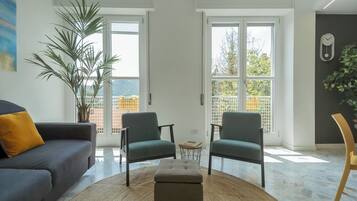 Apartment (2 Bedrooms) | Living area | 50-inch Smart TV with digital channels