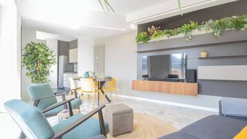 Apartment (2 Bedrooms) | Living area | 50-inch Smart TV with digital channels