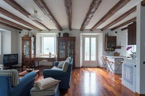 Apartment (2 Bedrooms) | Living area | 32-inch flat-screen TV with cable channels - Dreaming Terrace by Rent all Como (Carate Urio)