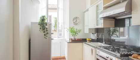 Apartment (1 Bedroom) | Private kitchen | Microwave, oven, stovetop, dishwasher