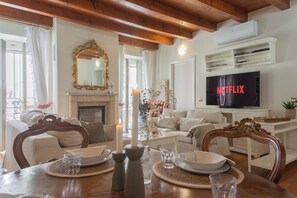 Apartment (2 Bedrooms) | Living area | 32-inch TV with cable channels