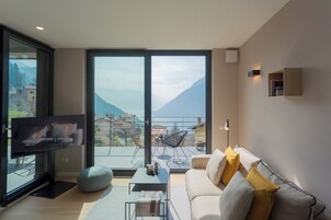 Apartment (1 Bedroom) | Living area | 32-inch Smart TV with digital channels