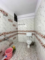 Deluxe Double Room, City View | Bathroom | Shower, free toiletries, towels, soap