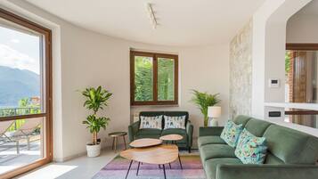 Villa (4 Bedrooms) | Living area | 32-inch TV with cable channels