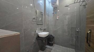 Shower, towels, soap, shampoo