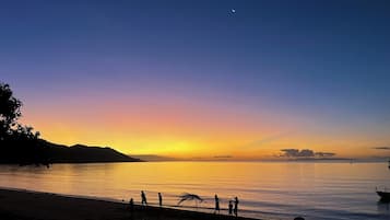 Na praia, toalhas de praia