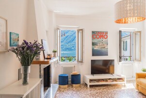 Apartment (1 Bedroom) | Living area | 32-inch flat-screen TV with cable channels